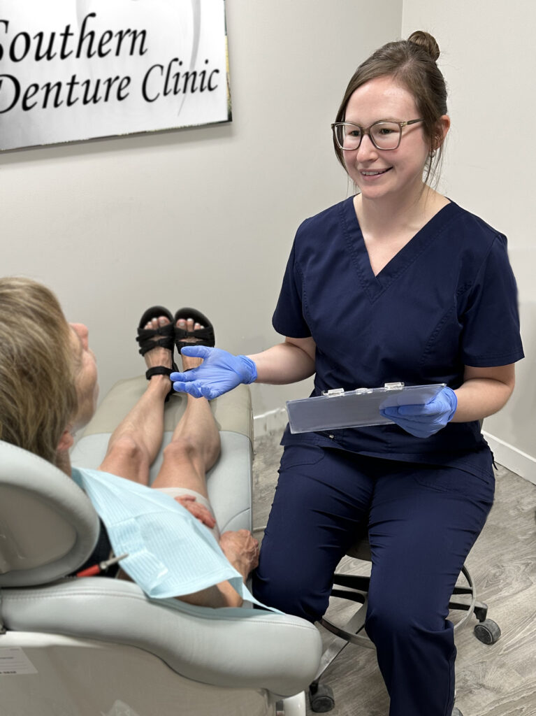 Monica with a patient showing samples